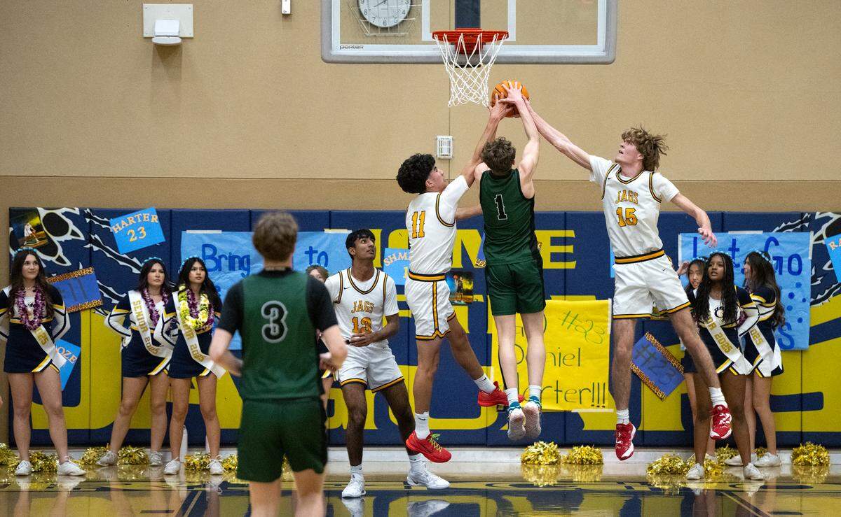 Gregori’s Jayson Powers, right, and Raphael Rosas defend on Pitman’s Avery Sanchez during the Central California Athletic League game at Gregori High School in Modesto, Wednesday, Feb. 12, 2025.