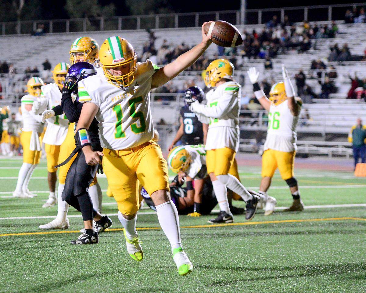 Davis running back Lukas Silva (15) celebrates after scoring a touchdown during a game between Johansen and Davis at Johansen High School in Modesto California on November 1, 2024.