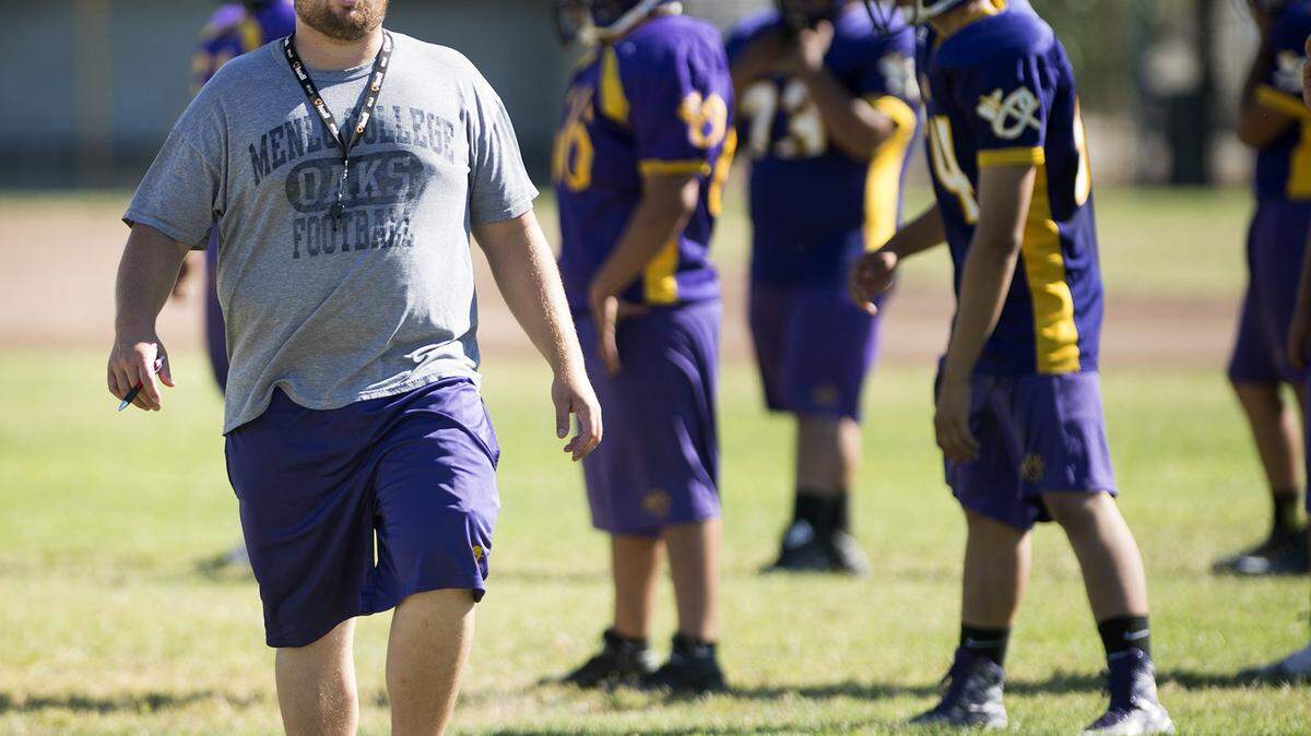 Under coach Aaron Souza (left), the Orestimba High football team has posted back-to-back seasons of at least 10 wins, a feat matched only by Oakdale and Sonora in the Stanislaus District.