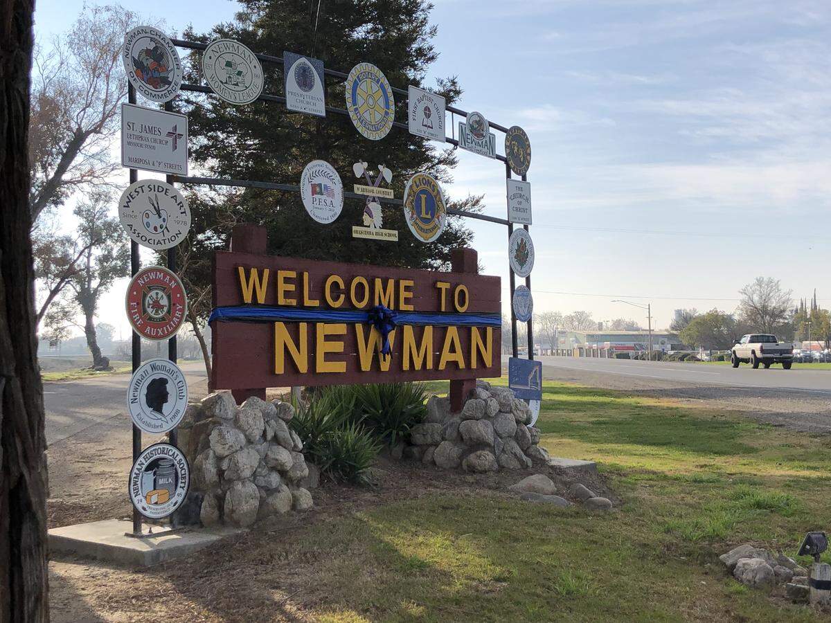 There are a couple of viewings on Friday to honor Newman Police Cpl. Ronil Singh, who was shot to death the morning after Christmas. A blue ribbon is wrapped around the Newman city sign on Friday, Jan. 4, 2019.
