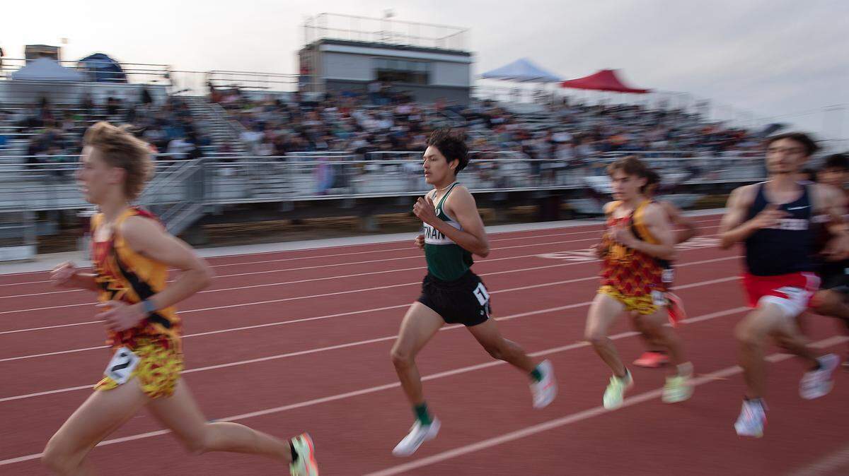 Pitman’s Damian Garcia, middle, won the boys 1600 meter race in the the Stanislaus County Championships at Riverbank High School in Riverbank, Calif., on Friday, March 18, 2022.