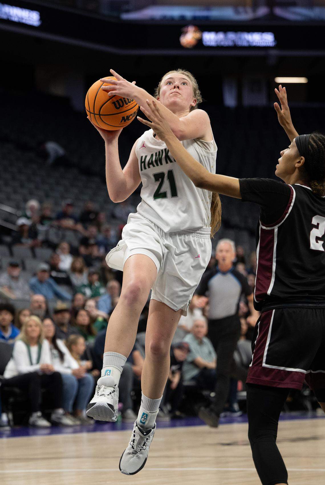 Liberty Ranch’s Haley Smith scores on Riverbank’s Taylor Macias during the Sac-Joaquin Section D-4 championship game at the Golden 1 Center in Sacramento, Thursday, February, 27, 2025.