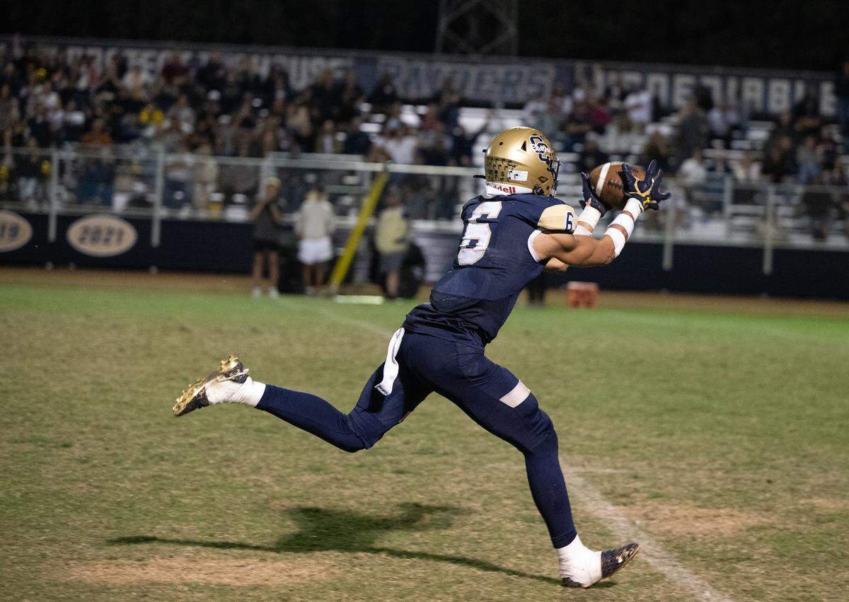 Central Catholic’s Brooklyn Cheek makes a catch for a touchdown during the Valley Oak League game with Manteca at Central Catholic High School in Modesto, Calif., Friday, Oct. 20, 2023.