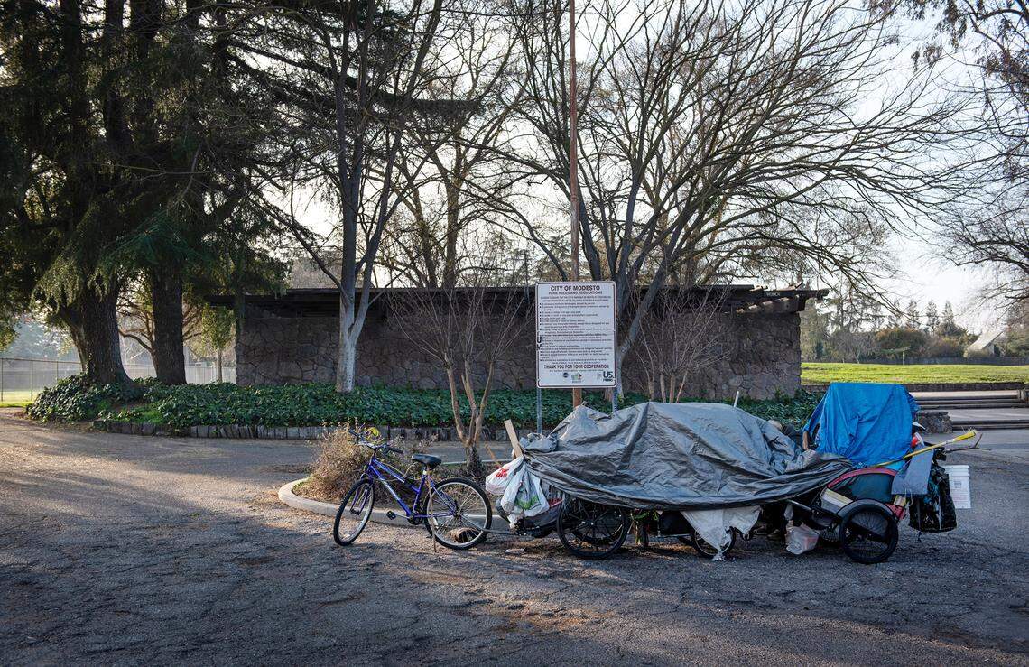 A homeless person makes a stop in Sherwood Park in Modesto, Calif., Friday, Jan. 27, 2023.
