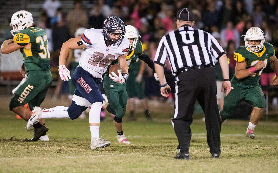 Modesto Christian’s Issac Schinmann breaks free for a 53-yard touchdown run during the Trans Valley League game at Hilmar High School in Hilmar, Calif., on Friday, Oct. 12, 2018. Modesto Christian won the game 24-21.