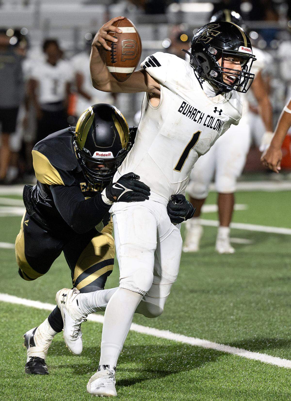 Enochs’ Sebastian Campos sacks Buhach Colony quarterback Patrick Curran during the non-league game at Gregori High School in Salida, Calif., Friday, Sept. 1, 2023.