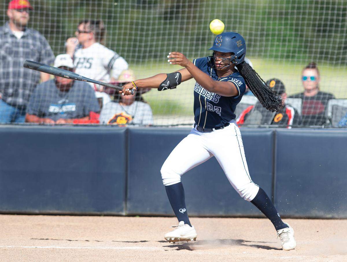 Central Catholic’s Emry Couch hits an infield single during the Valley Oak League game with Oakdale at Central Catholic High School in Modesto, Calif., Tuesday, April 25, 2023.