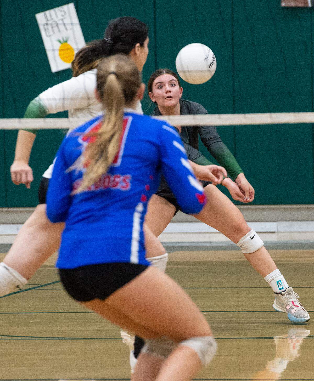 Pitman’s Reese Carmona returns the ball during the CIF Sac-Joaquin Girls Volleyball Division I playoff match with Folsom at Pitman High School in Turlock, Calif., Thursday, Oct. 27, 2022.