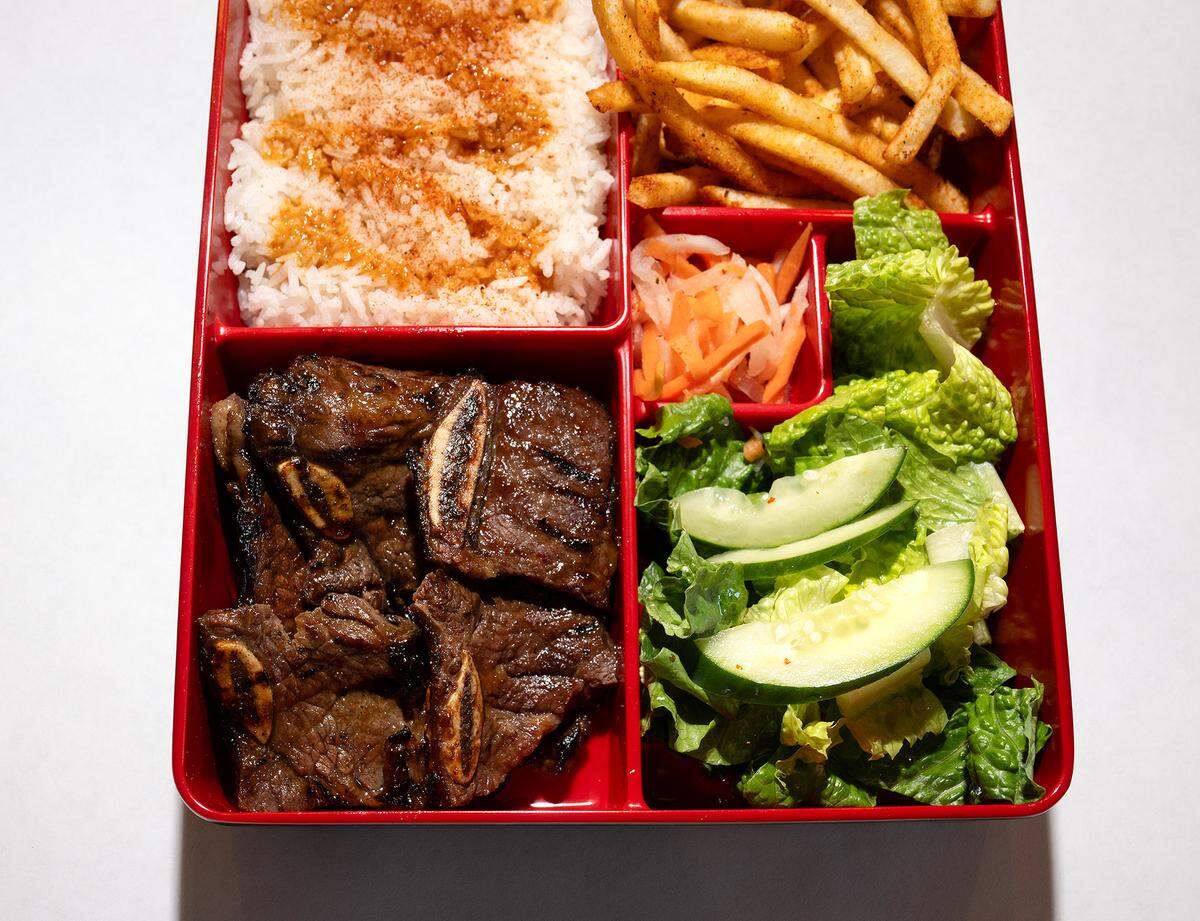 Rice bento with short ribs and cajun fries at Cajun Bento restaurant in Turlock, Wednesday, Jan. 29, 2025.