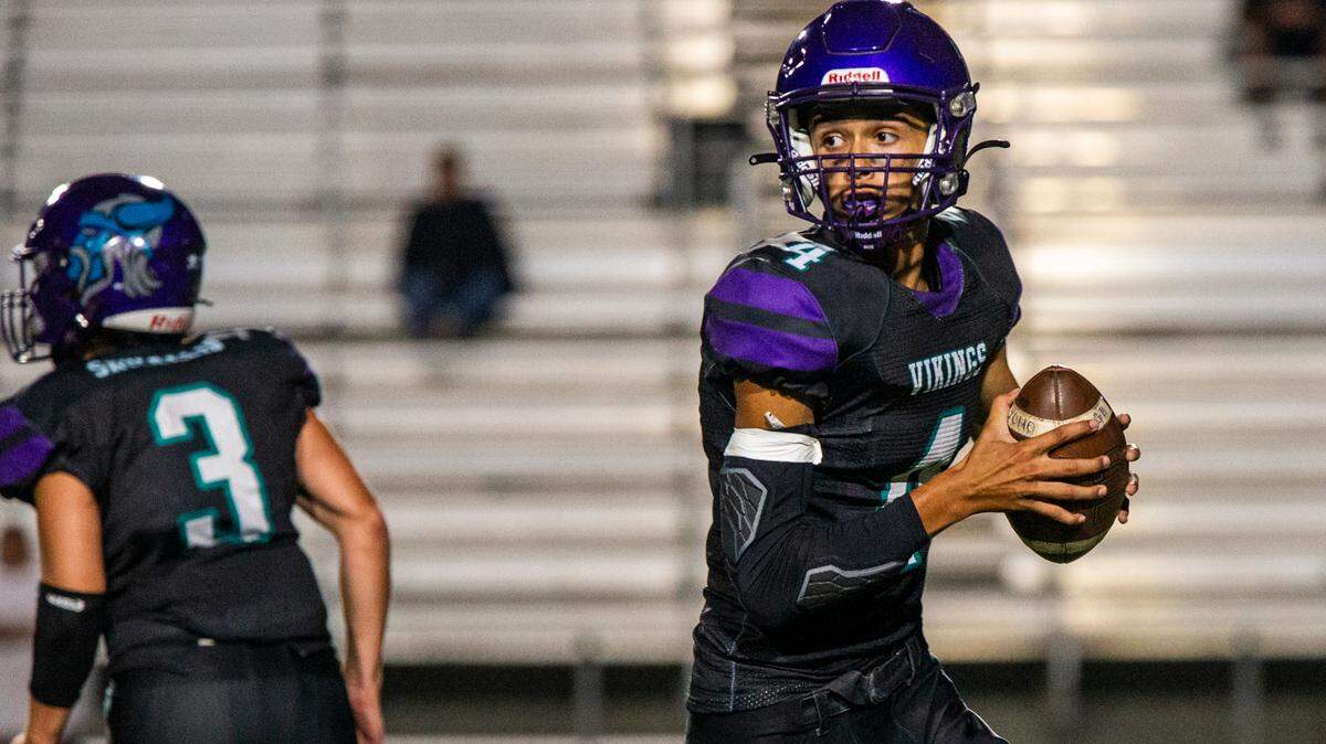 Joe Carranza, 4, of Johansen High looks up field for an open man during the non-league game with Bear River at Johansen High School in Modesto Calif., Friday, Sept. 1, 2023.