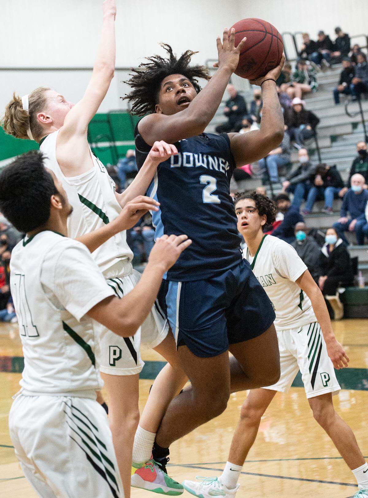 Downey’s Jahmaree Gonder scores during the Central California Athletic League game with Pitman at Pitman High School in Turlock, Calif., on Friday, Feb. 4, 2022. Downey won the game 56-52.