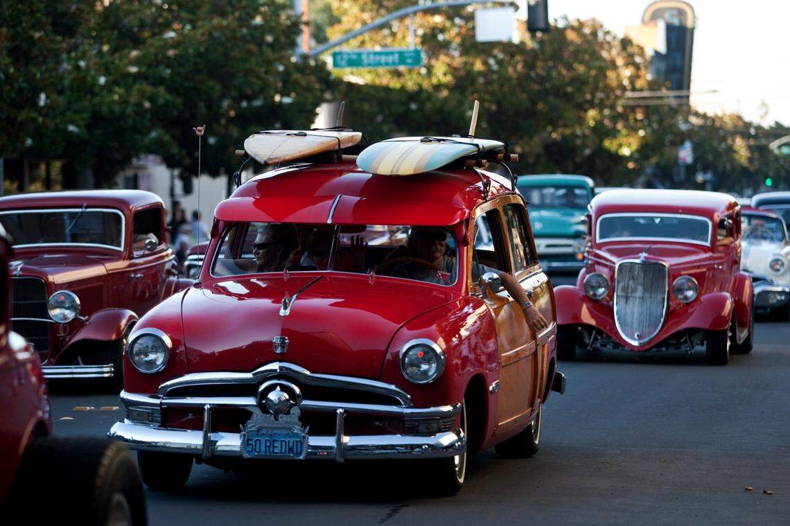 Classic cars parade along J Street during a past year’s Graffiti Summer in Modesto.