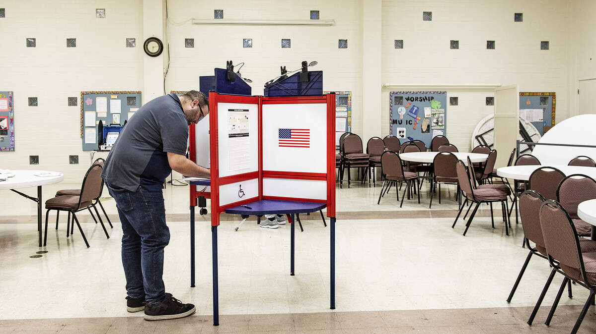 Fred Smith votes at Geneva Presbyterian Church in Modesto, Calif., on Tuesday, March. 3, 2020.