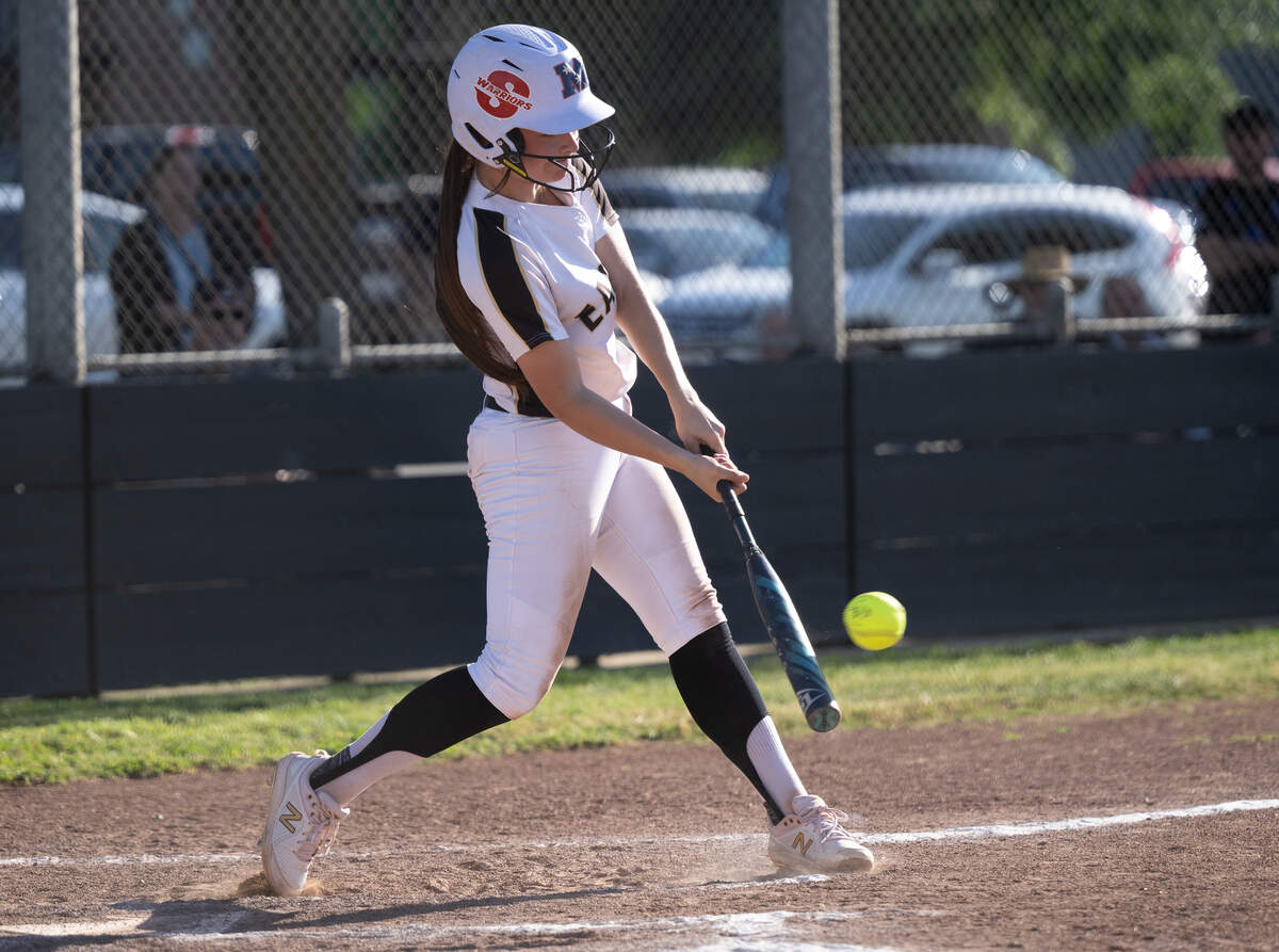 Enochs’ Lillian Camarena drives a low pitch for a run-scoring double during the Central California Athletic League game with Gregori at Enochs High School in Modesto on  Monday, April 6, 2026. Enochs won the game 7-4.