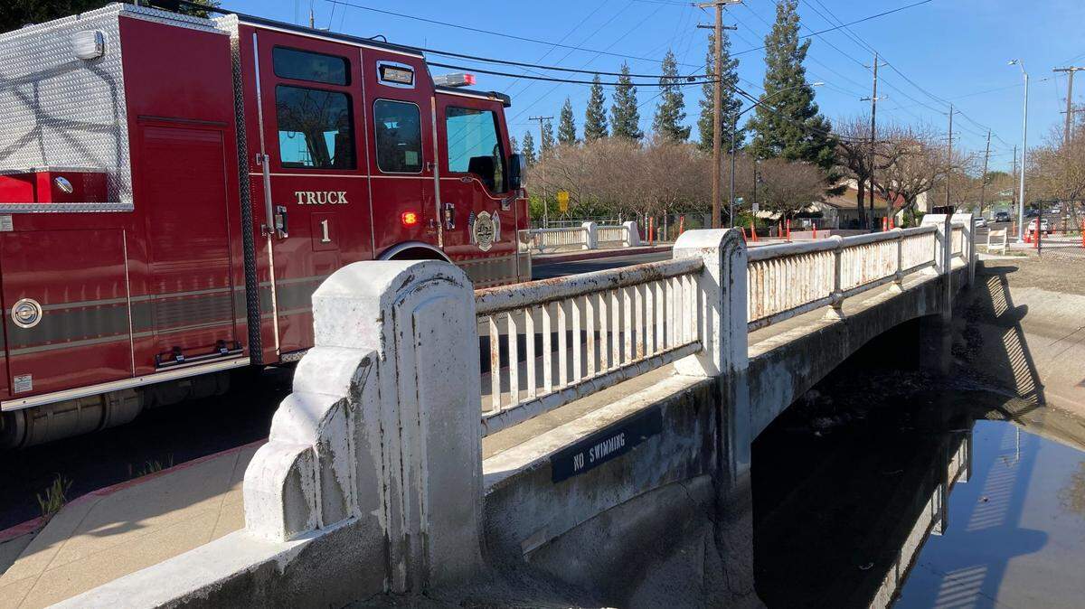 Modesto Fire Truck 1 at Root Lateral Canal and Stoddard Avenue, during investigation of a dead body in the canal on March 27, 2023.