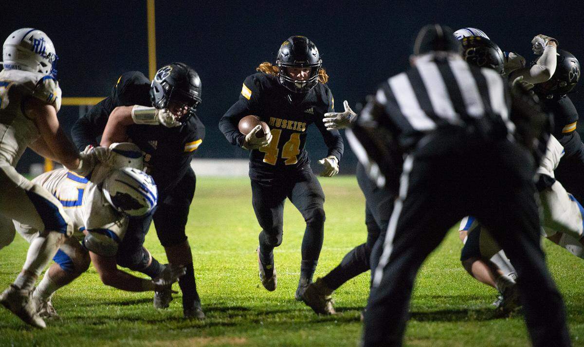 Hughson’s Liam Bridgford runs in for a touchdown during the CIF Division 5-AA Northern California Regional Bowl Game with Ripon Christian on Friday, Dec. 2, 2022, in Hughson, Calif. Hughson won 31-28.