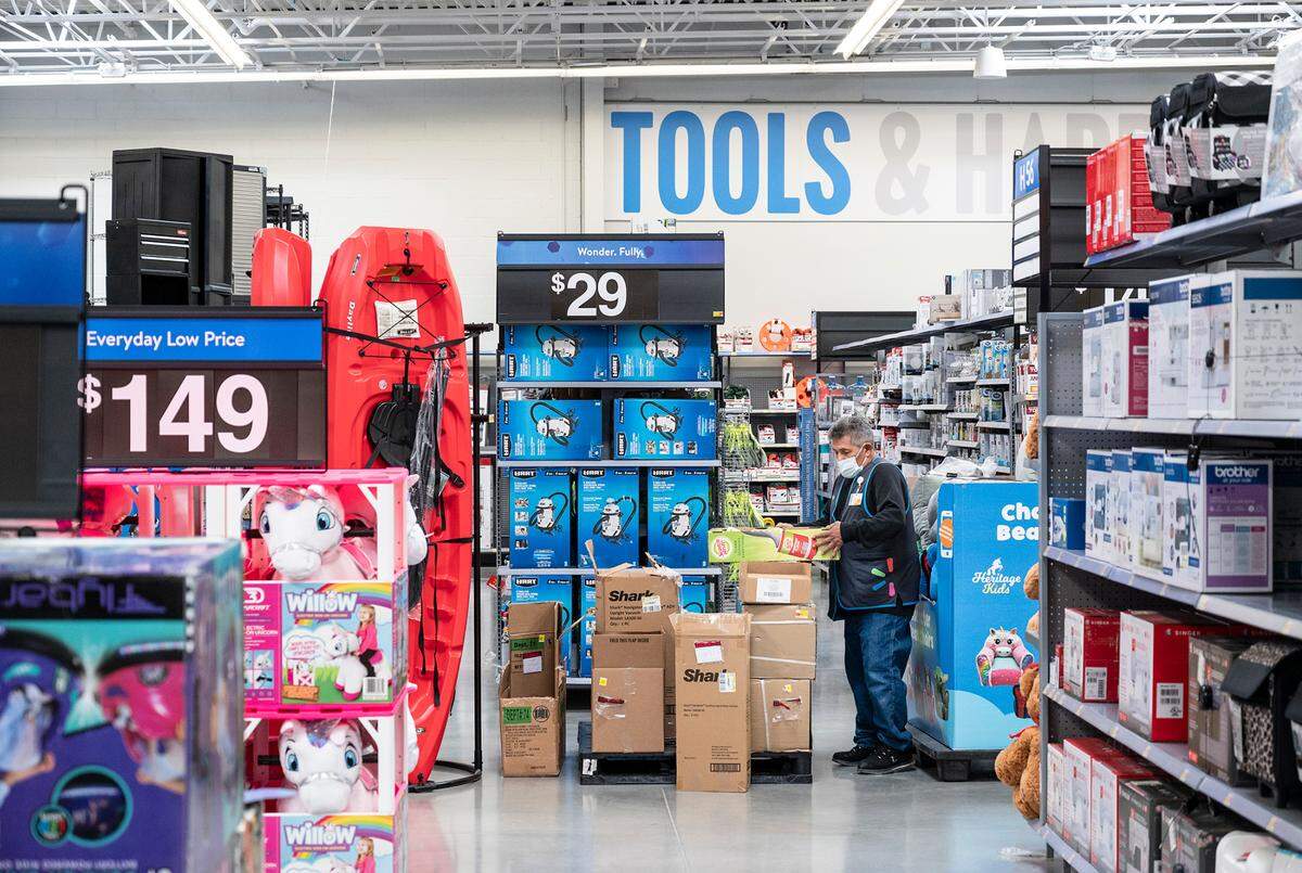 Employees prepare for Friday’s grand opening of the Walmart Supercenter in Ceres ,Calif., on Wednesday, Nov. 17, 2021.