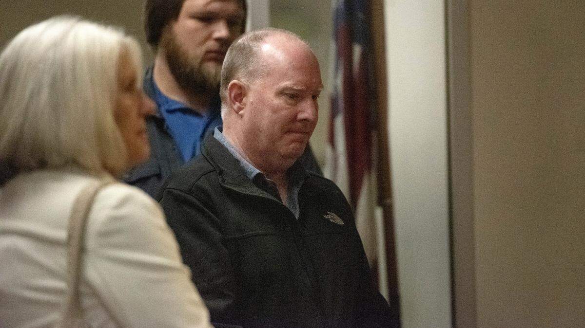 James Hooker waits outside Department 3 of Stanislaus Superior Court on Monday, Nov. 17, 2025, before a hearing in his felony case.