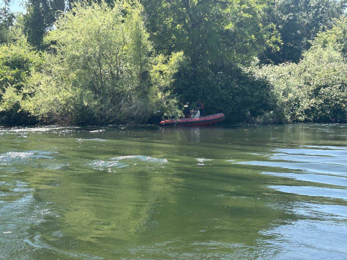 Rescue crews search along the Stanislaus River during a Memorial Day weekend water rescue response in Oakdale. Authorities responded to multiple river rescues across Stanislaus County during the holiday weekend.