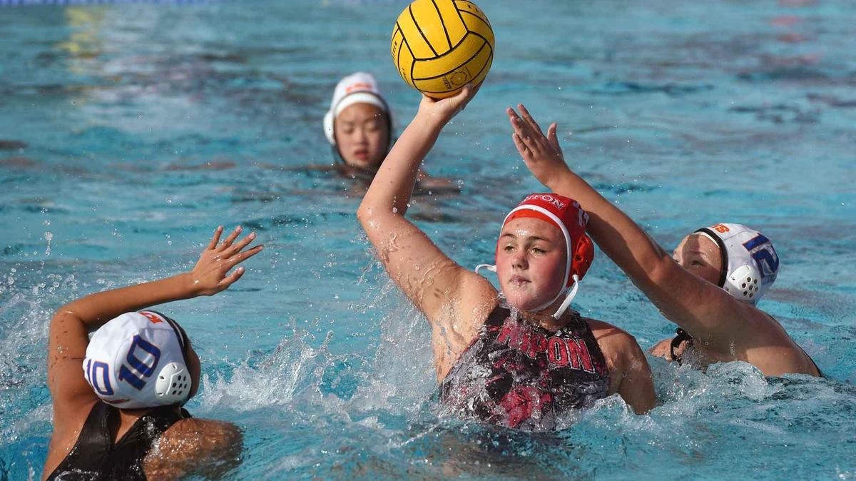 Ripon’s Molly Burton looks to pass the ball in a Division 111 section water polo semifinal against Kimball high school Tuesday November 12, 2019 at Johansen high school in Modesto, Calif.