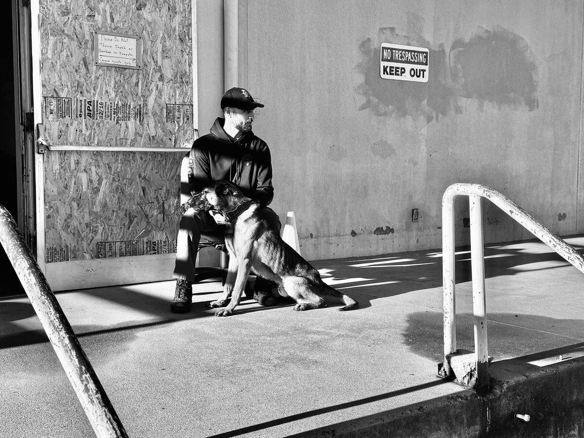 Deputy Mason McKinstry sits with his K9 partner Zero.
