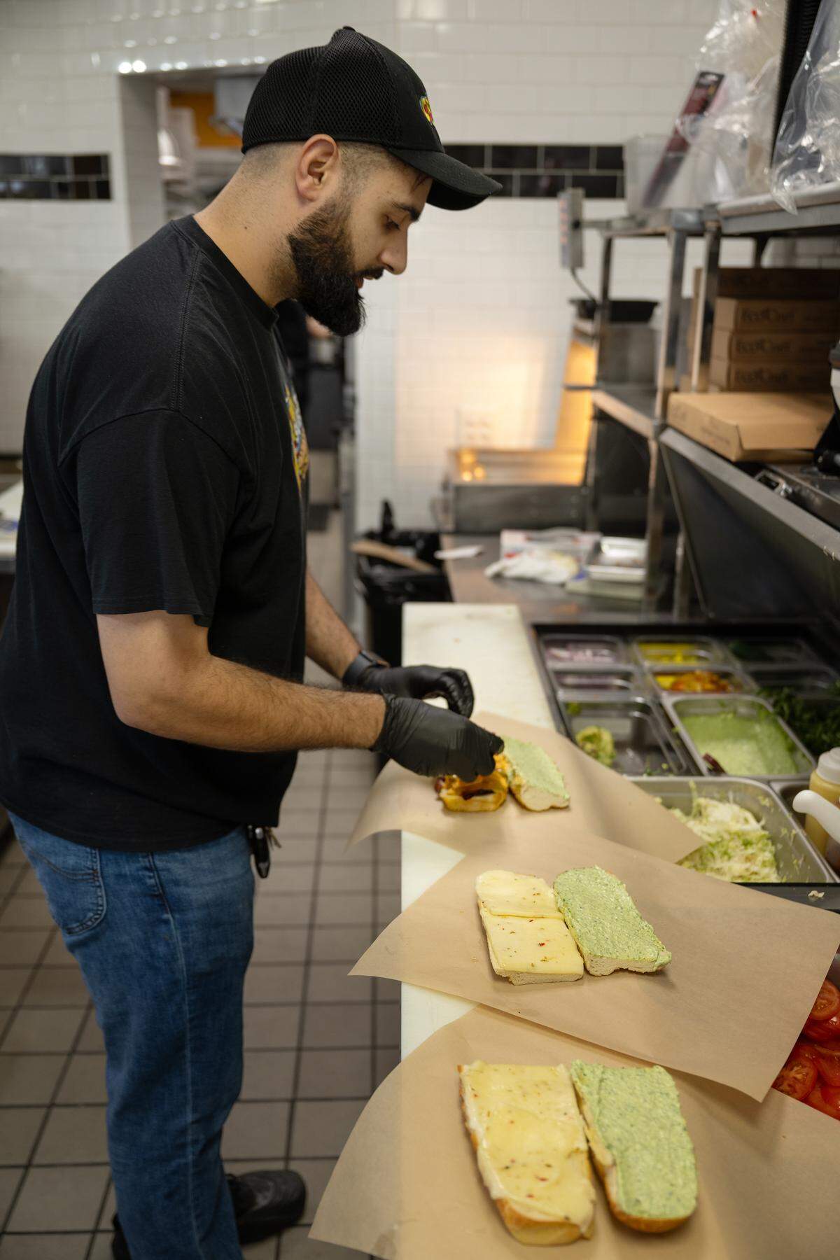 Co-Owner Mohammed Suleman prepares a sandwich at Crave Subs in Modesto on Tuesday, Jan. 20, 2026. 