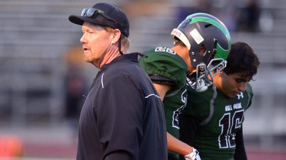 Pitman Head Coach Tom Tyler walks the field before a game between Pitman and Summerville High School at Turlock High School in Turlock CA on September 14, 2018.