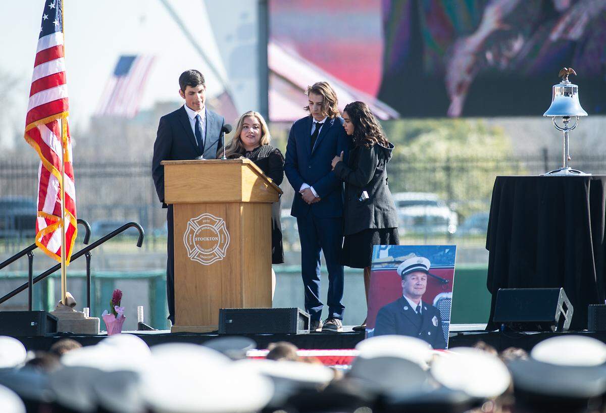 Samantha Velasquez speaks about her father, fallen Stockton Fire Capt. Vidal “Max” Fortuna, during a memorial service at the Banner Island Ballpark in Stockton, Calif., on Tuesday, Feb. 8, 2022.