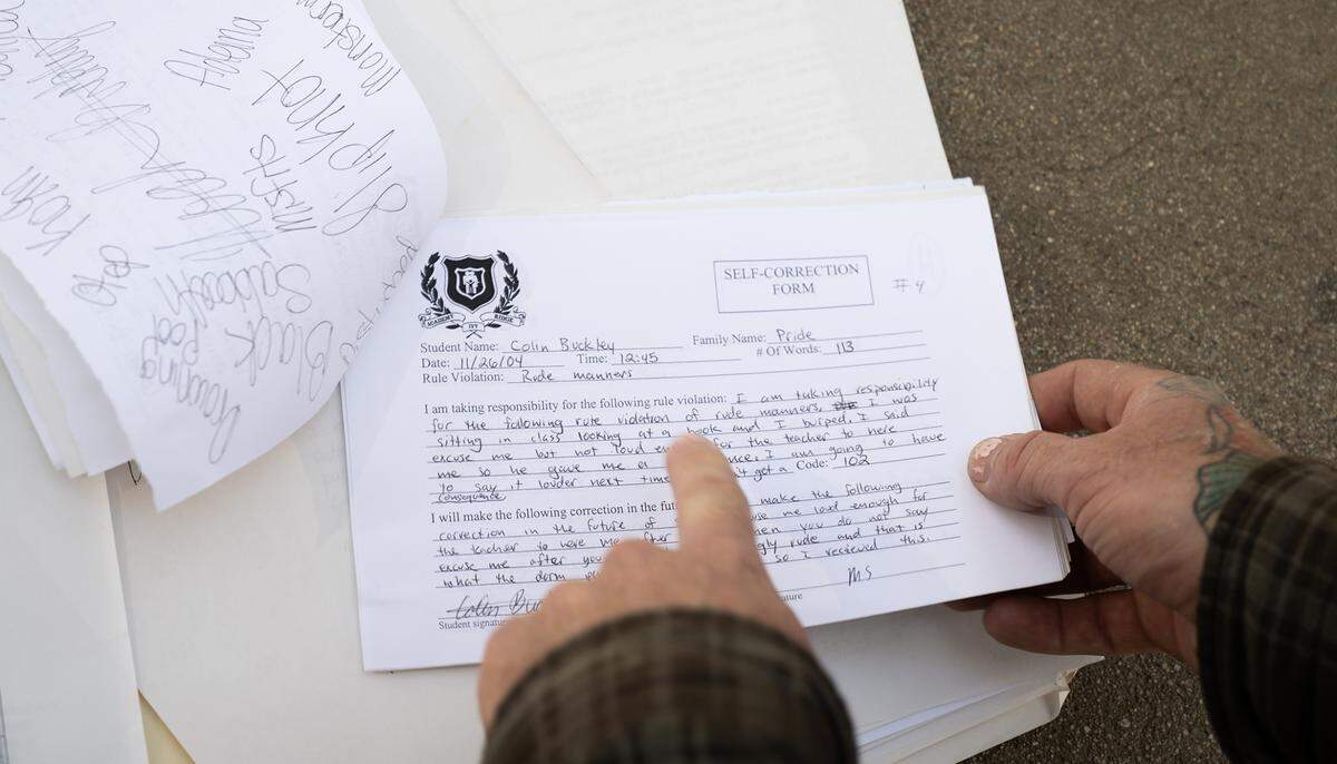 Colin Buckley shows paperwork of his rule violation at the Academy at Ivy Ridge. At 15, Buckley was sent to the Academy at Ivy Ridge, the same boarding school that is the subject of the Netflix documentary, “The Program: Cons, Cults and Kidnapping.”