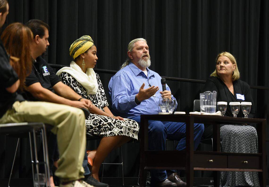 At a Focus on Prevention event at Modesto Centre Plaza on Oct. 1, 2015, Randy Limburg, center, speaks about his personal experience with being homeless.