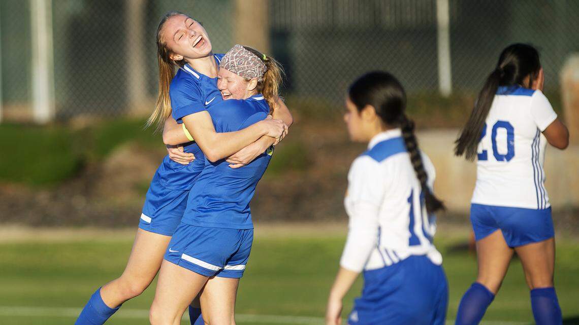 Ripon Christian’s Rachael Oosterman, right, and Elle Van Wyngarden celebrate an Oosterman goal during the Southern league game with Waterford in Ripon, Calif., on Thursday, Feb. 6, 2020. Ripon Christian won the game Waterford 3-2.