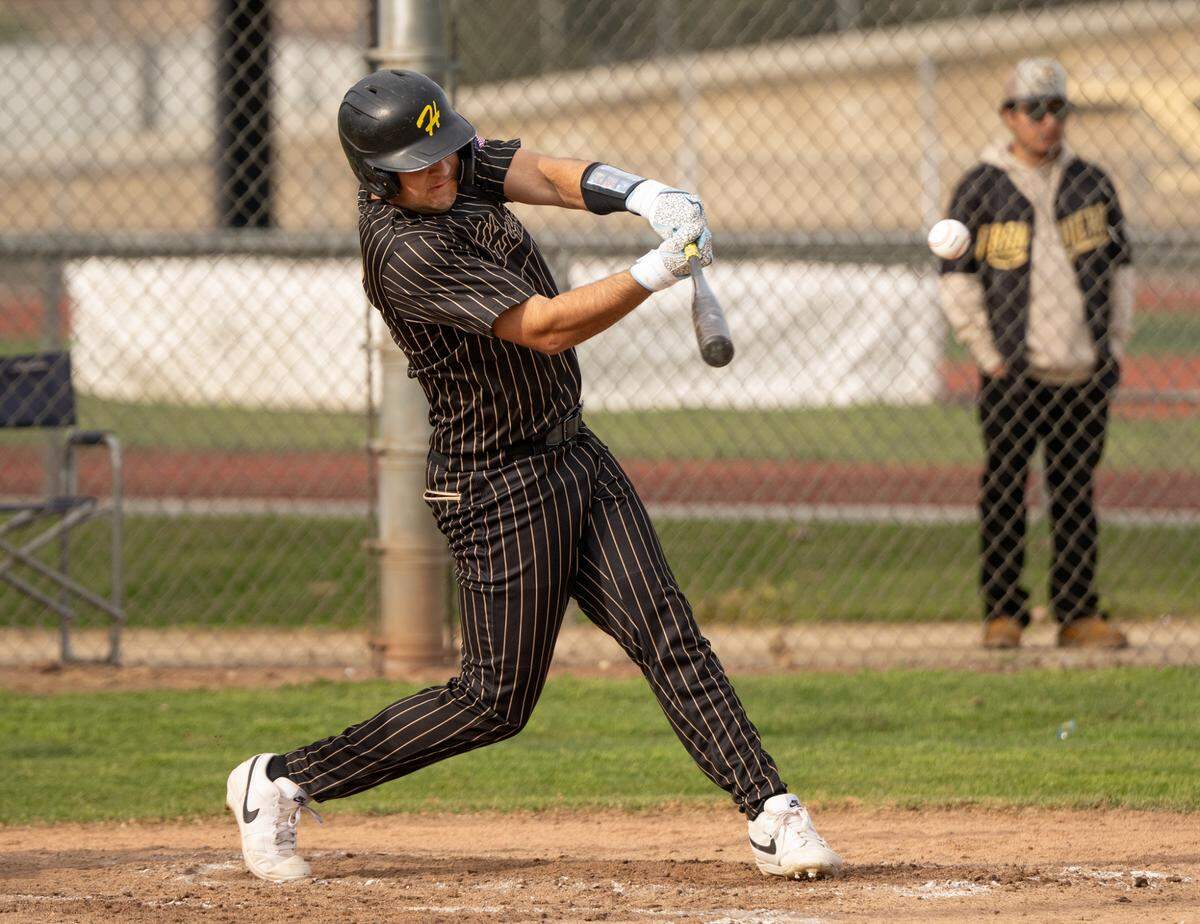 Hughson’s Max Mankins singles to right field during a Trans-Valley League game with Orestimba in Hughson, Calif., Friday, March 28, 2025.