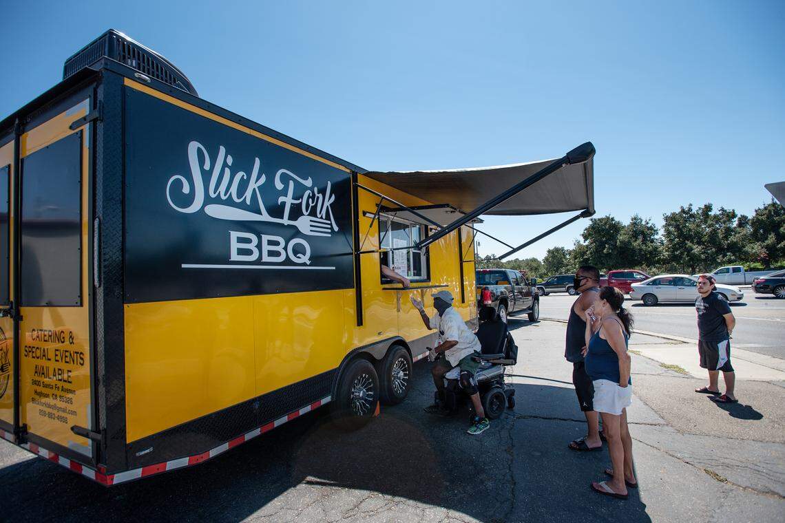 Slick Fork BBQ food truck at the corner of Coffee Road and Scenic Drive in Modesto, Calif., on Saturday, August 1, 2020.