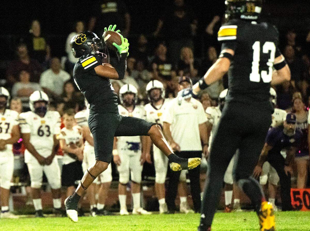 Hughson’s Valente Soria sealed the win with an interception with 1:12 left in the game with Escalon in Hughson, Calif., Friday, Oct. 4, 2024. 