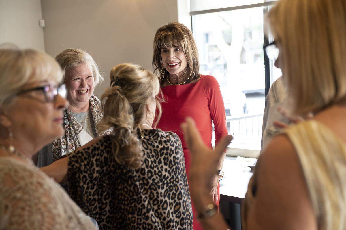 Co-owner Jennifer Doerksen talks with guests during preview night at First & Main Restaurant in Turlock, Calif., Wednesday, Aug. 28, 2019.