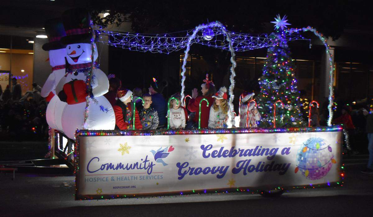 Community Hospice got in the groove of the disco theme Saturday night, Dec. 7, 2024, in the Celebration of Lights Holiday Parade in downtown Modesto.