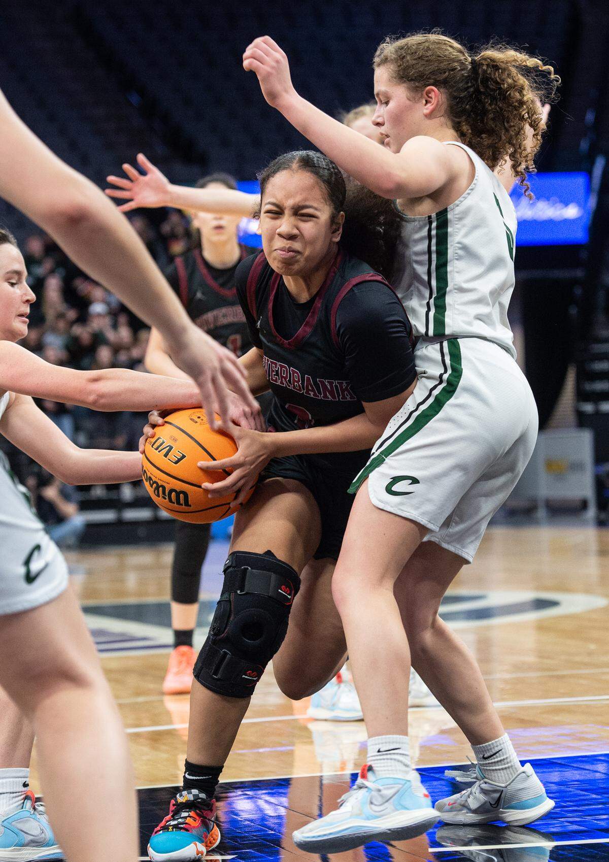 Riverbank’s Sione Mol battles through Colfax defenders during the Sac-Joaquin Section Division IV championship game at Golden 1 Center in Sacramento, Calif., Friday, Feb. 24, 2023.