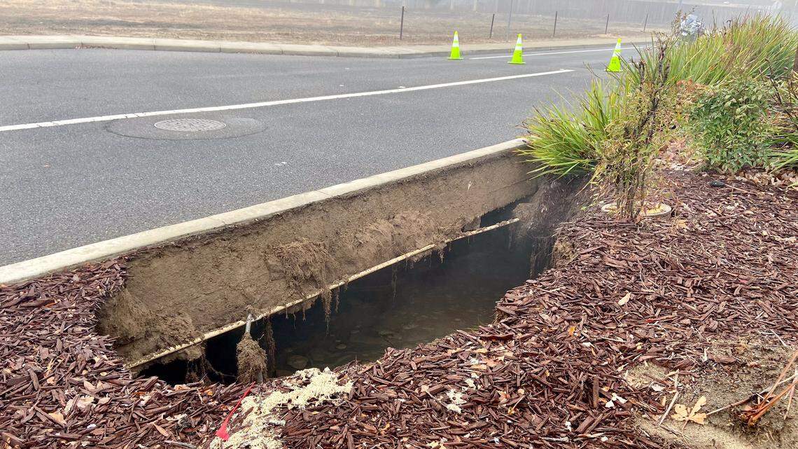 A large sinkhole closed a portion of West Tuolumne Road is closed between N. Golden State Boulevard and North Tully Road in Turlock, California on Thursday, Dec. 5, 2019.