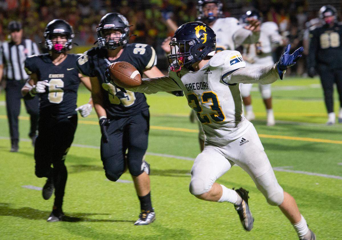 Gregori’s Michael Marsden crosses the end zone for the game winning touchdown during the Central California Athletic League game with Enochs at Downey High School in Modesto, Calif., Friday, Sept. 30, 2022. Gregori won the game 36-30 in overtime.