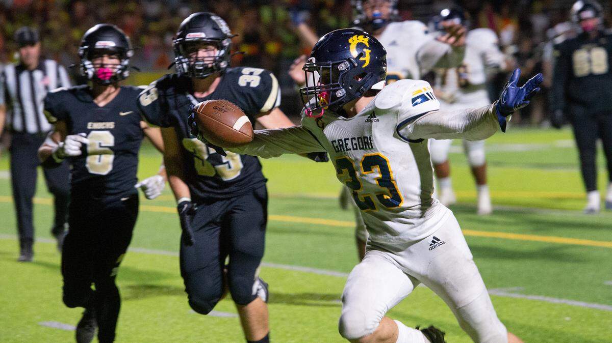 Gregori’s Michael Marsden crosses the end zone for the game winning touchdown during the Central California Athletic League game with Enochs at Downey High School in Modesto, Calif., Friday, Sept. 30, 2022. Gregori won the game 36-30 in overtime.