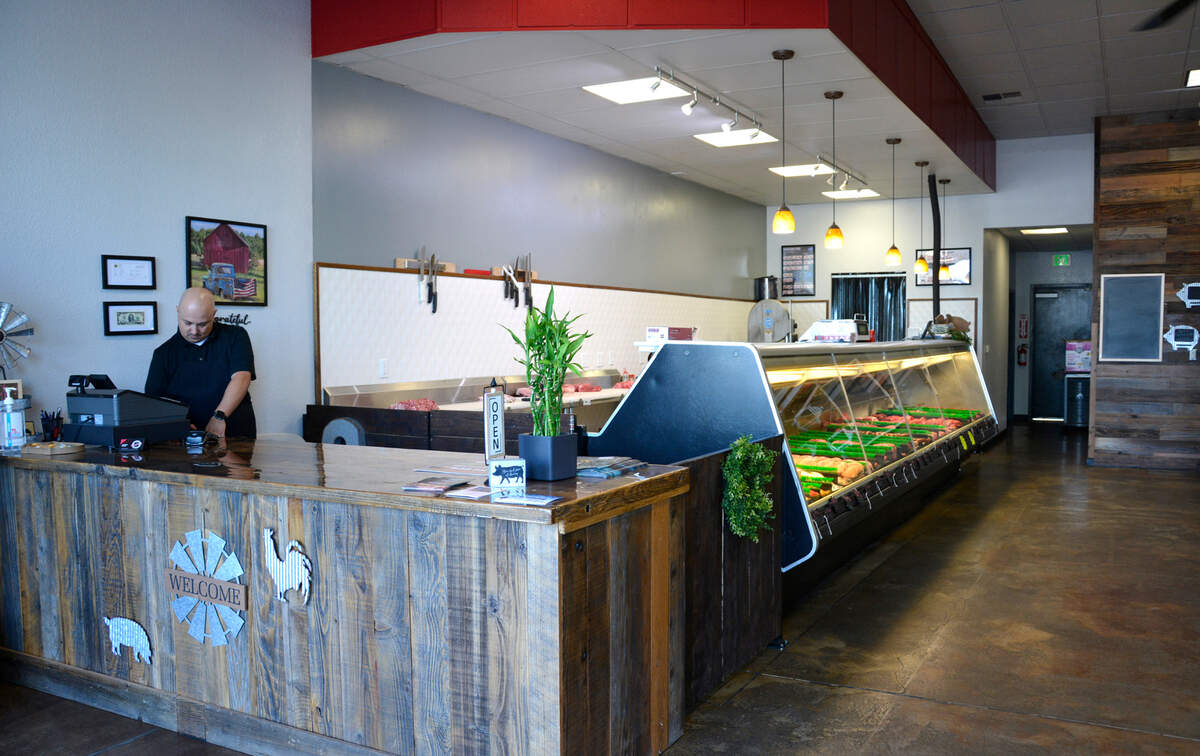 Co-owner Sal Virgen inside his new store, Chuck’s Butcher Shop in Hughson, Calif.