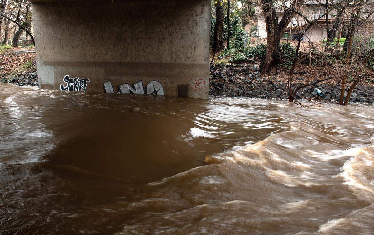 Water level in Dry Creek is rising as a result of the recent storms in Modesto, Calif., Thursday, Dec. 29, 2022.