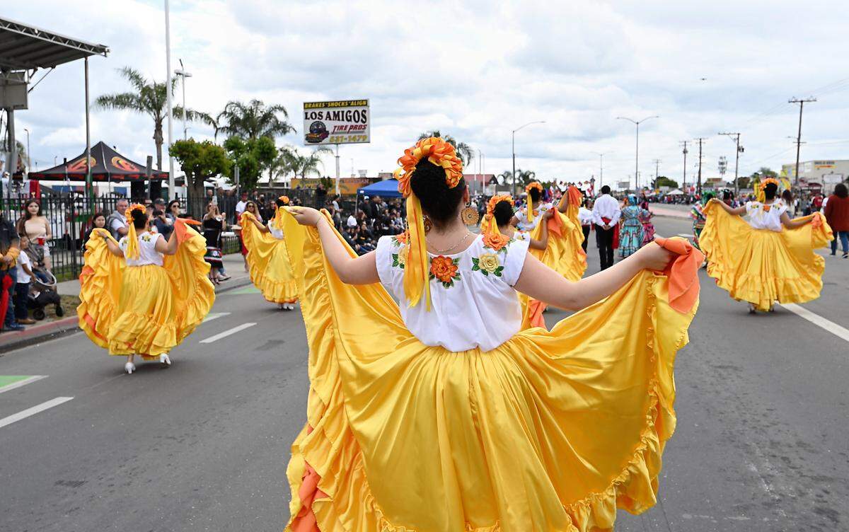 Members of Ballet Folklorico Los Falcones perform in the Cinco de Mayo parade on Crows Landing Road in Modesto, Calif., Saturday, May 6, 2023.