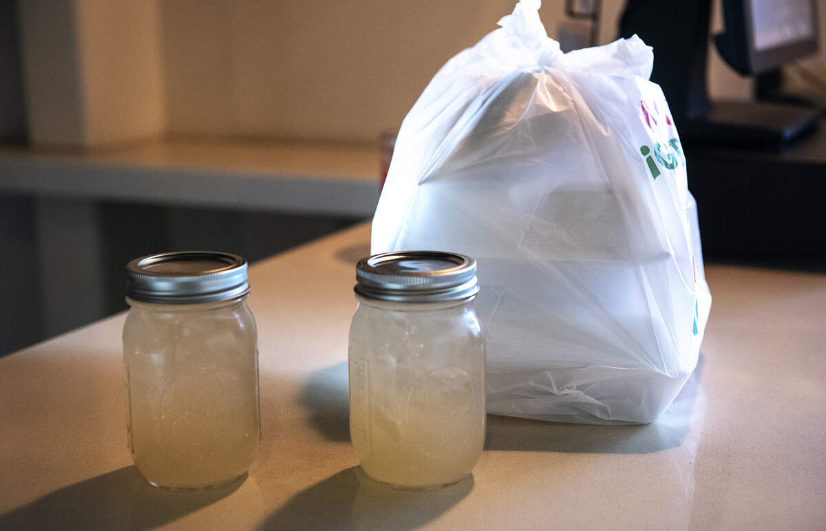 Take-out order with mixed-drinks at La Parilla in Modesto, Calif., on Saturday, March 21, 2020. The is allowing the sale of mixed drinks as long as it sold in a sealed container with food.