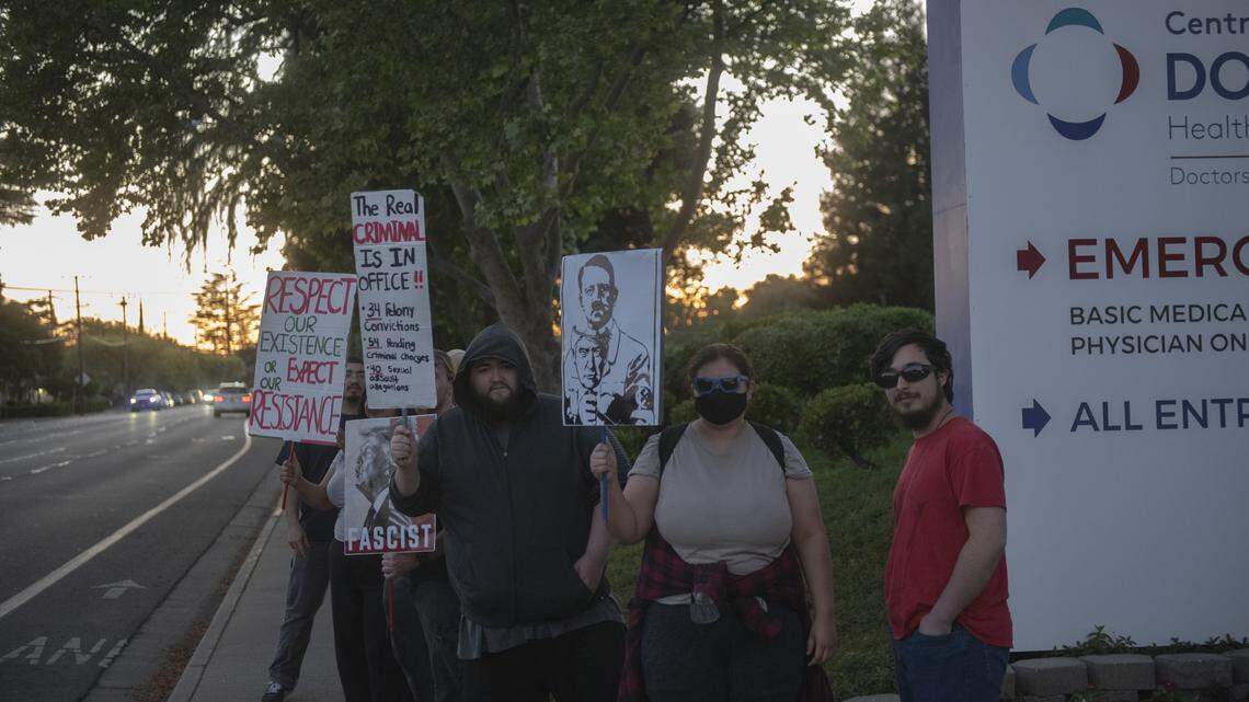 Demonstrators gather outside Doctors Medical Center in Modesto on Tuesday, April 7, 2026, following a shooting involving U.S. Immigration and Customs Enforcement agents in Patterson. 
 Carlos Mendoza Hernandez, the man shot by ICE, was arrested by the FBI as soon as he was discharged from the hospital. Since then, he’s been transferred several times to different federal facilities. 