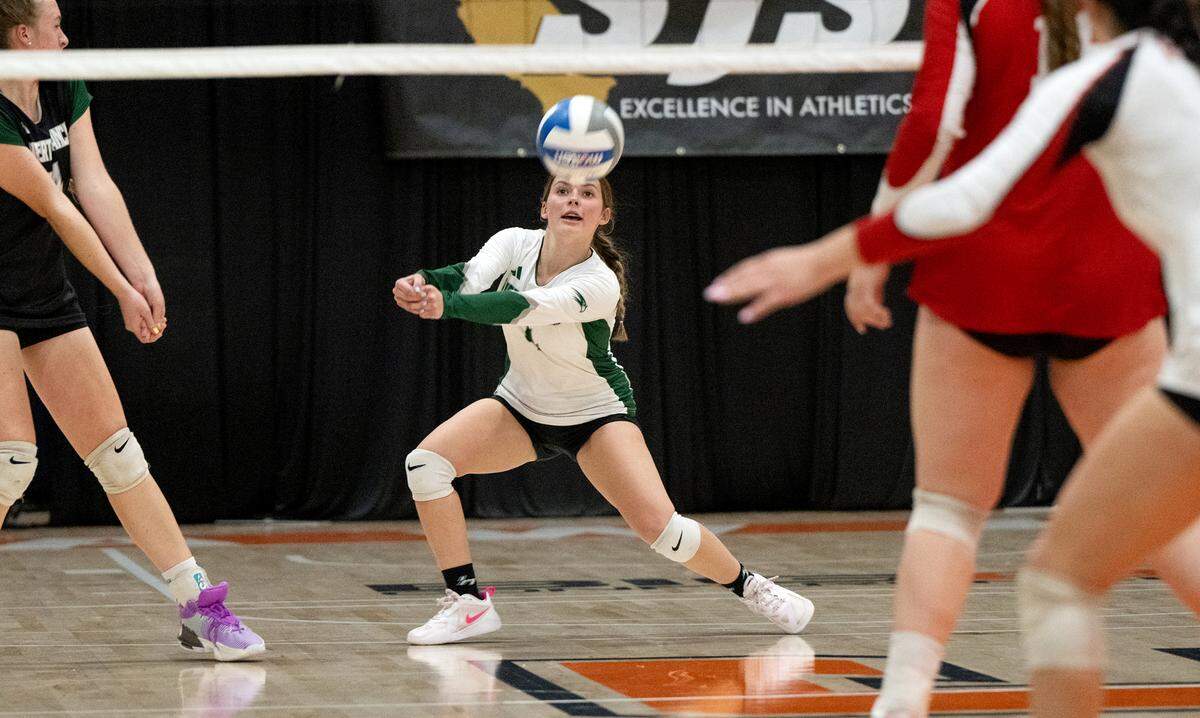 Liberty Ranch’s Lily Pittman returns a ball during the Sac-Joaquin Section Division IV volleyball championship match with Ripon at Cosumnes River College in Sacramento, Saturday, Nov. 9, 2024.