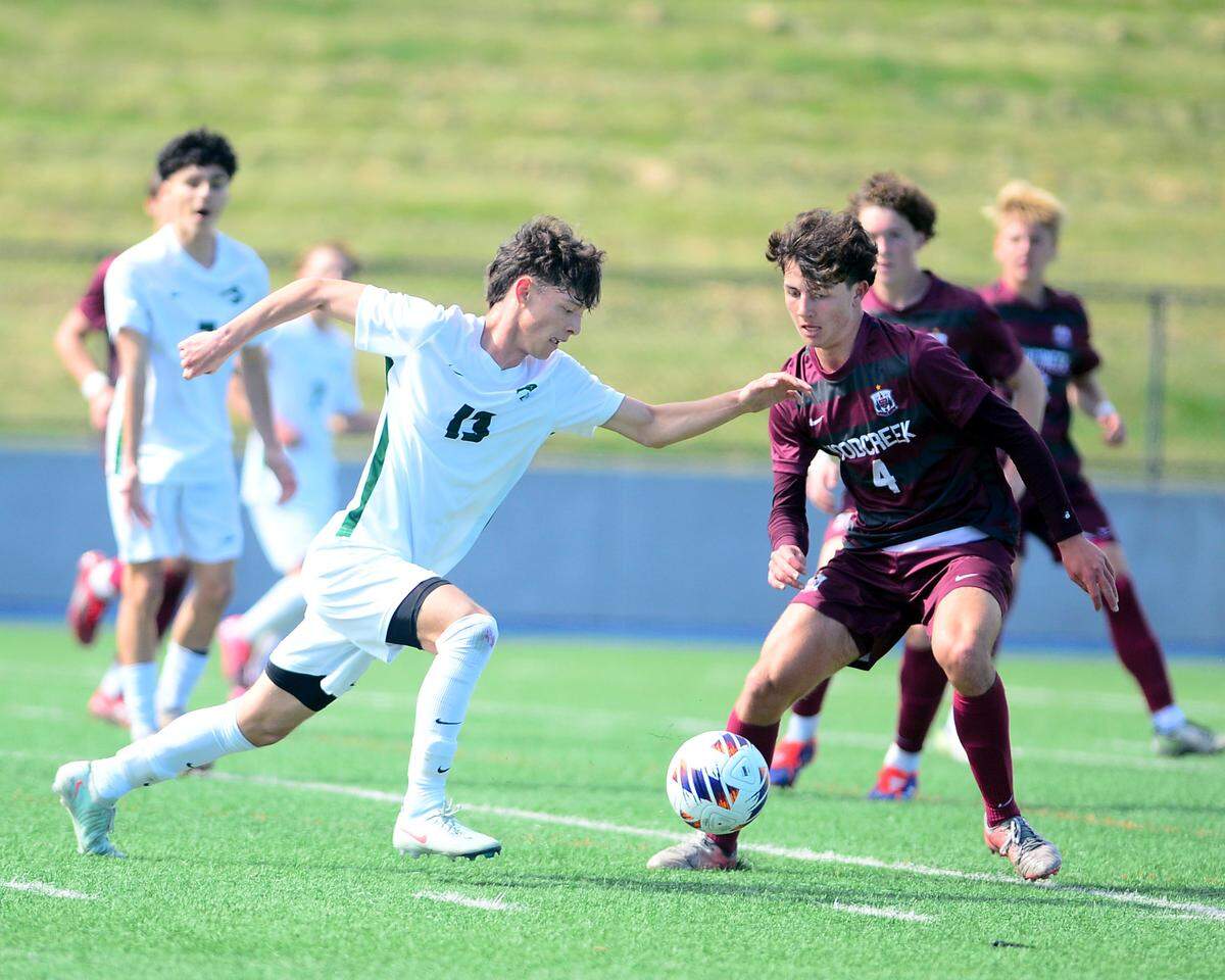 Pitman’s Nicholas Rodriguez (13) advances the ball during the Sac-Joaquin Section Division II championship against Woodcreek High School at Cosumnes River College in Sacramento, Calif. on Saturday, March 1, 2025.