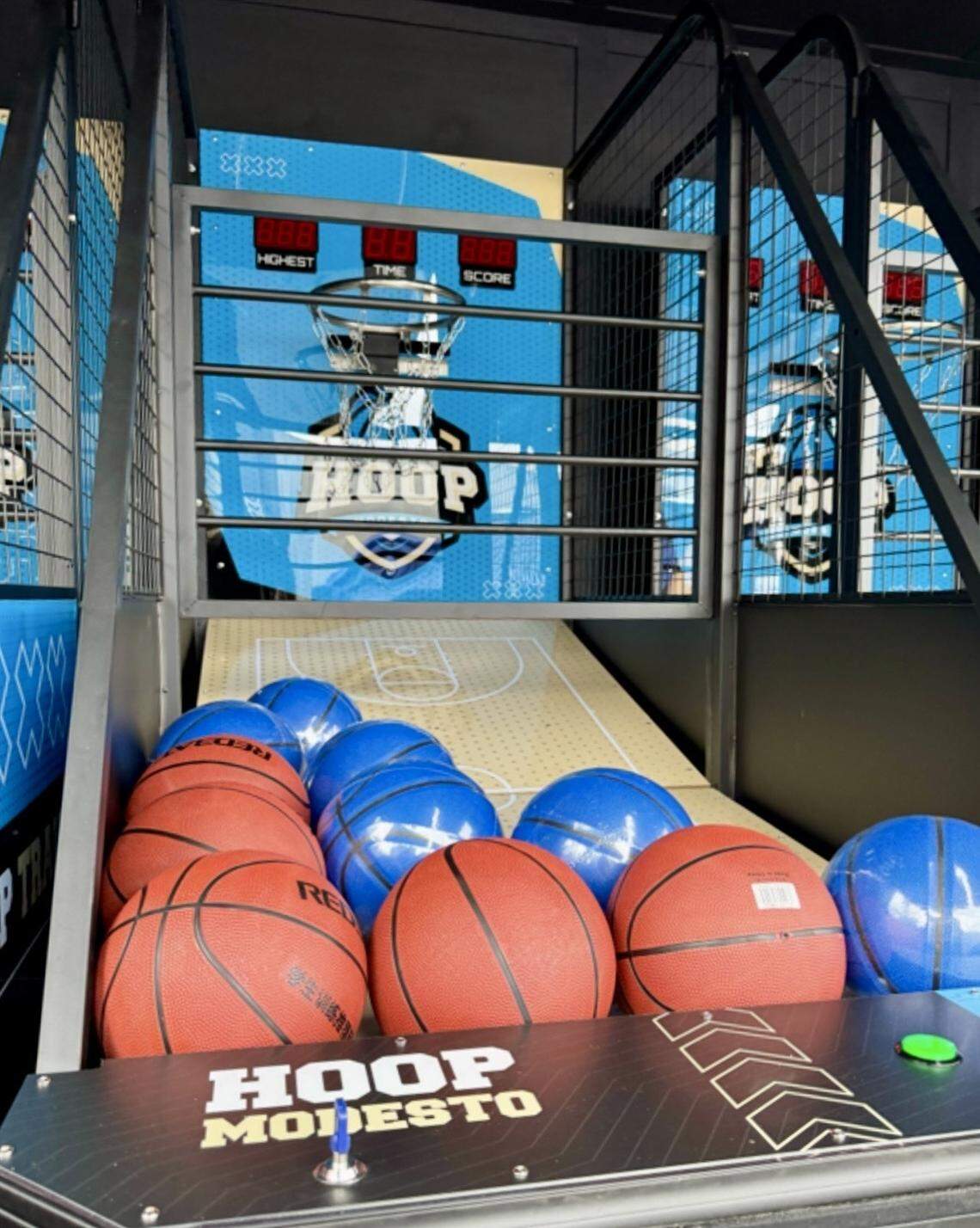 There are four stations in Hoop Modesto’s arcade basketball trailer.