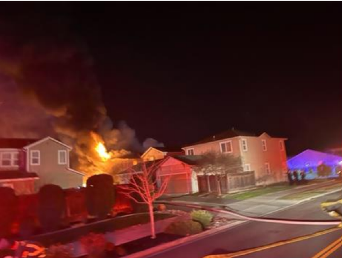 Firefighters respond to a structure fire at a single-family home on the 4100 block of Ivory Lane in Turlock on Tuesday, Jan. 9, 2024.
