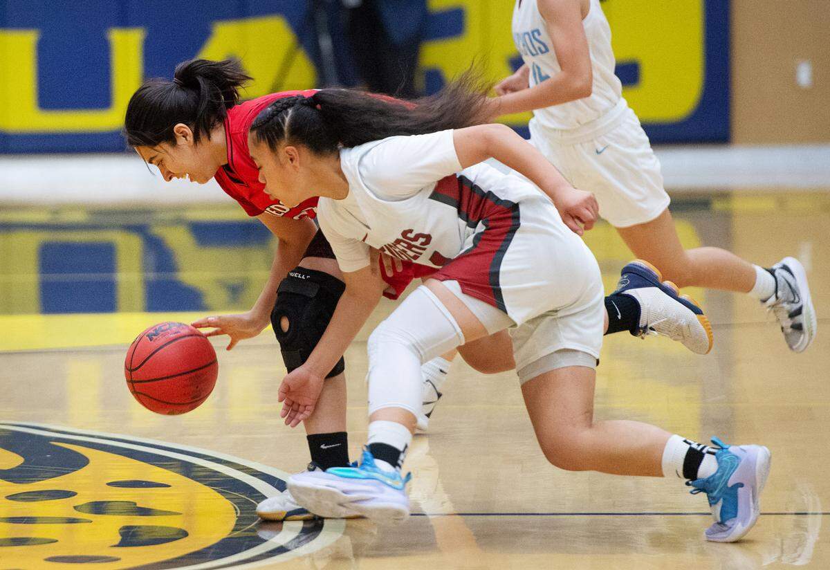 Patterson’s Ranaye Manu, front, pressures Gustine’s Ashley Lomeli during the Six-County Senior All-Star Basketball Game at Gregori High School in Salida, Friday, May 6, 2022.